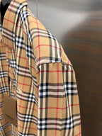 Burberry check long-sleeve button-up shirt sleeve and side seam detail
