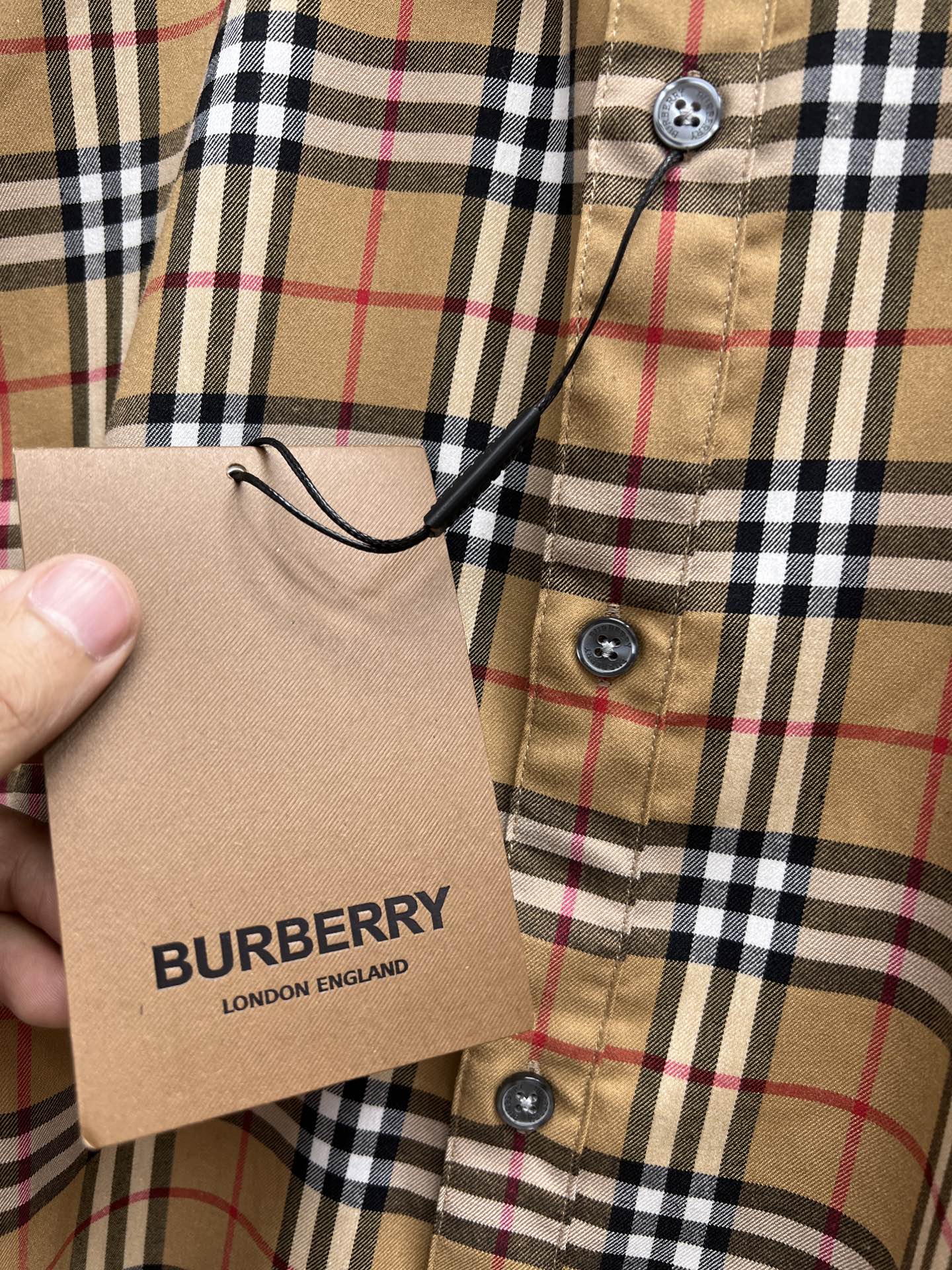 Burberry check button-up shirt with round buttons and neck tag
