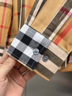 Long-sleeve check shirt in tan with black and white plaid, front with two buttons