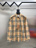 Burberry long-sleeve plaid button-up shirt on mannequin, tan, black, red, cream