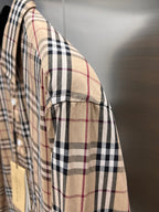 Plaid long-sleeve shirt side view with cuff seam detail