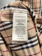 Burberry plaid shirt neck label with fabric composition and care text