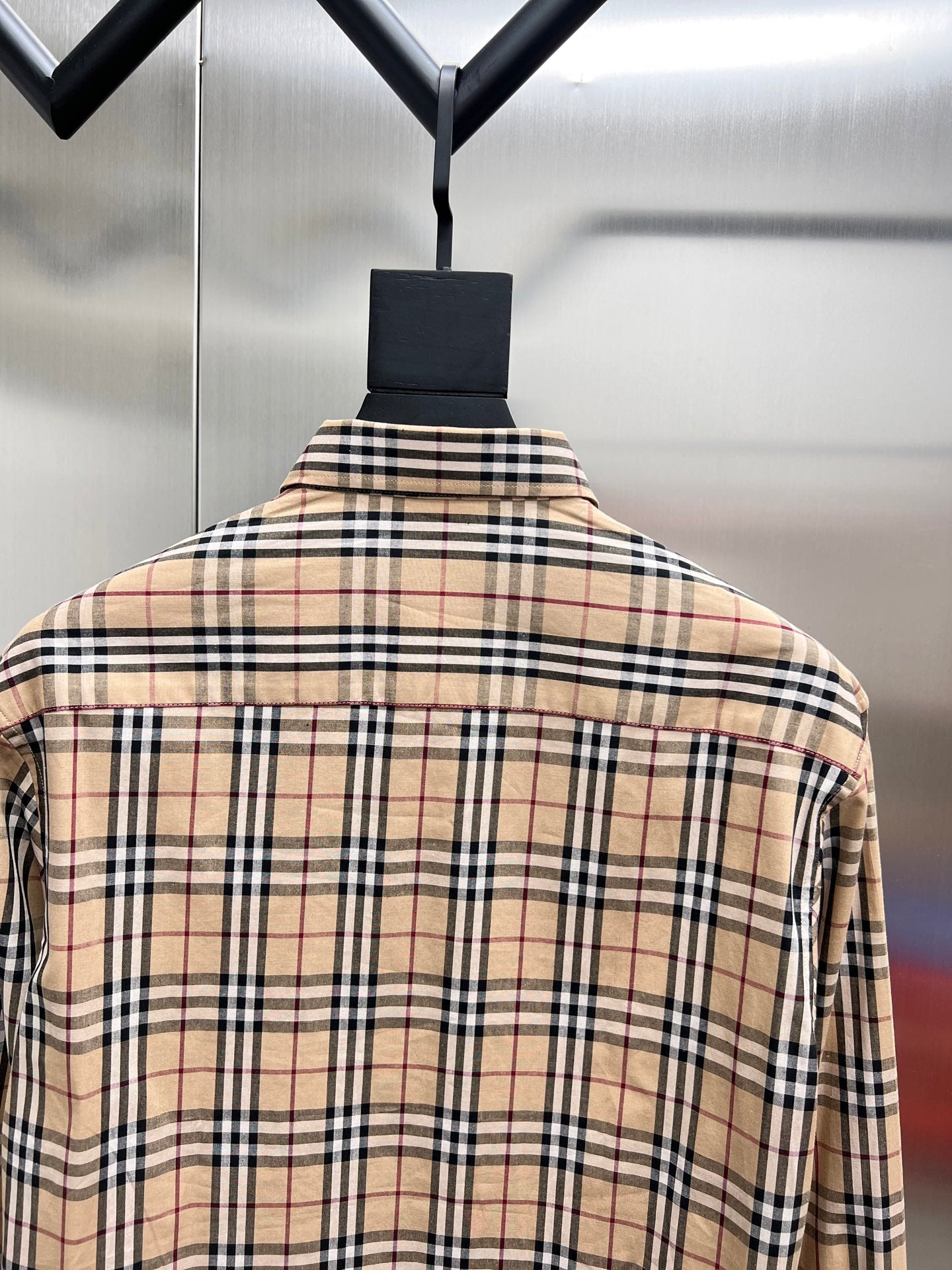 Beige plaid long-sleeve shirt with buttoned back yoke