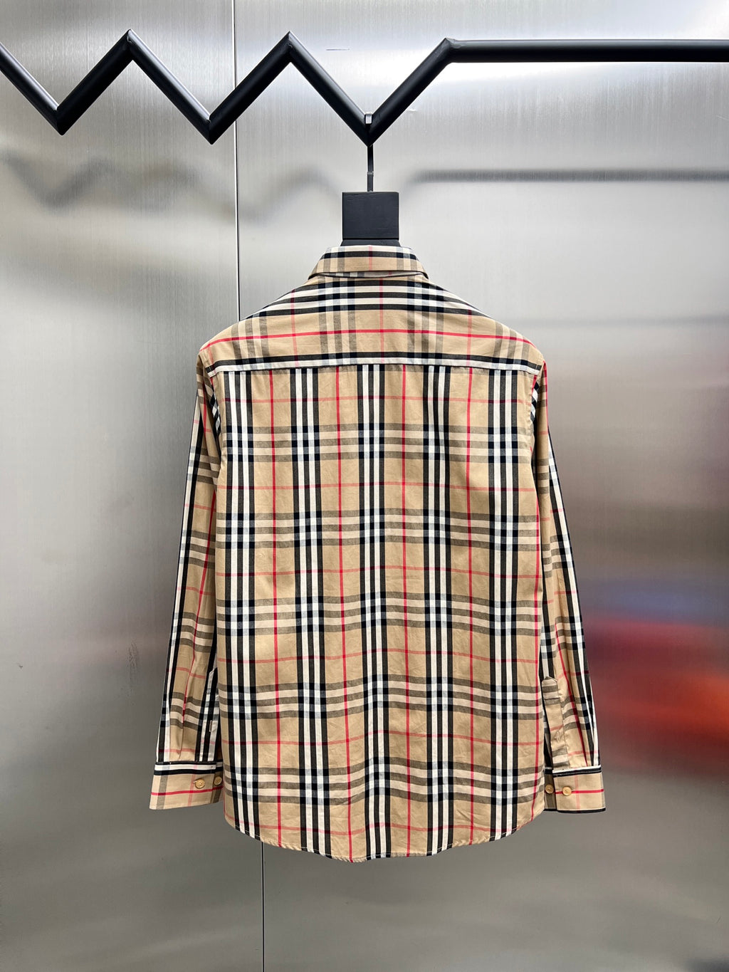 Plaid button-up shirt back view with pointed collar and long sleeves, tan/black/red check