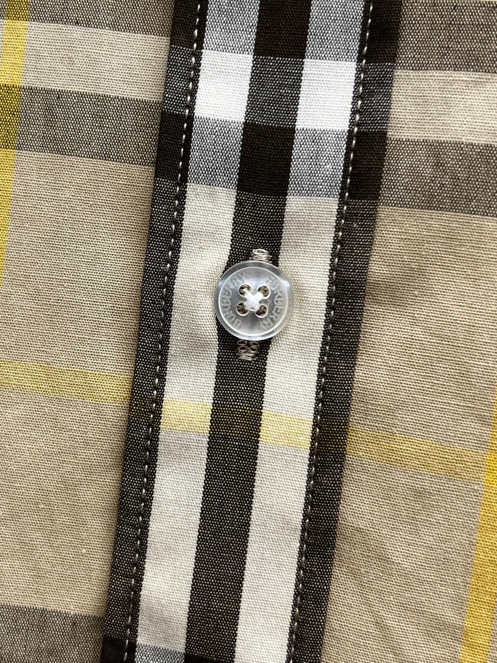 Plaid long-sleeve shirt button front, cream base with black and yellow vertical stripe checks