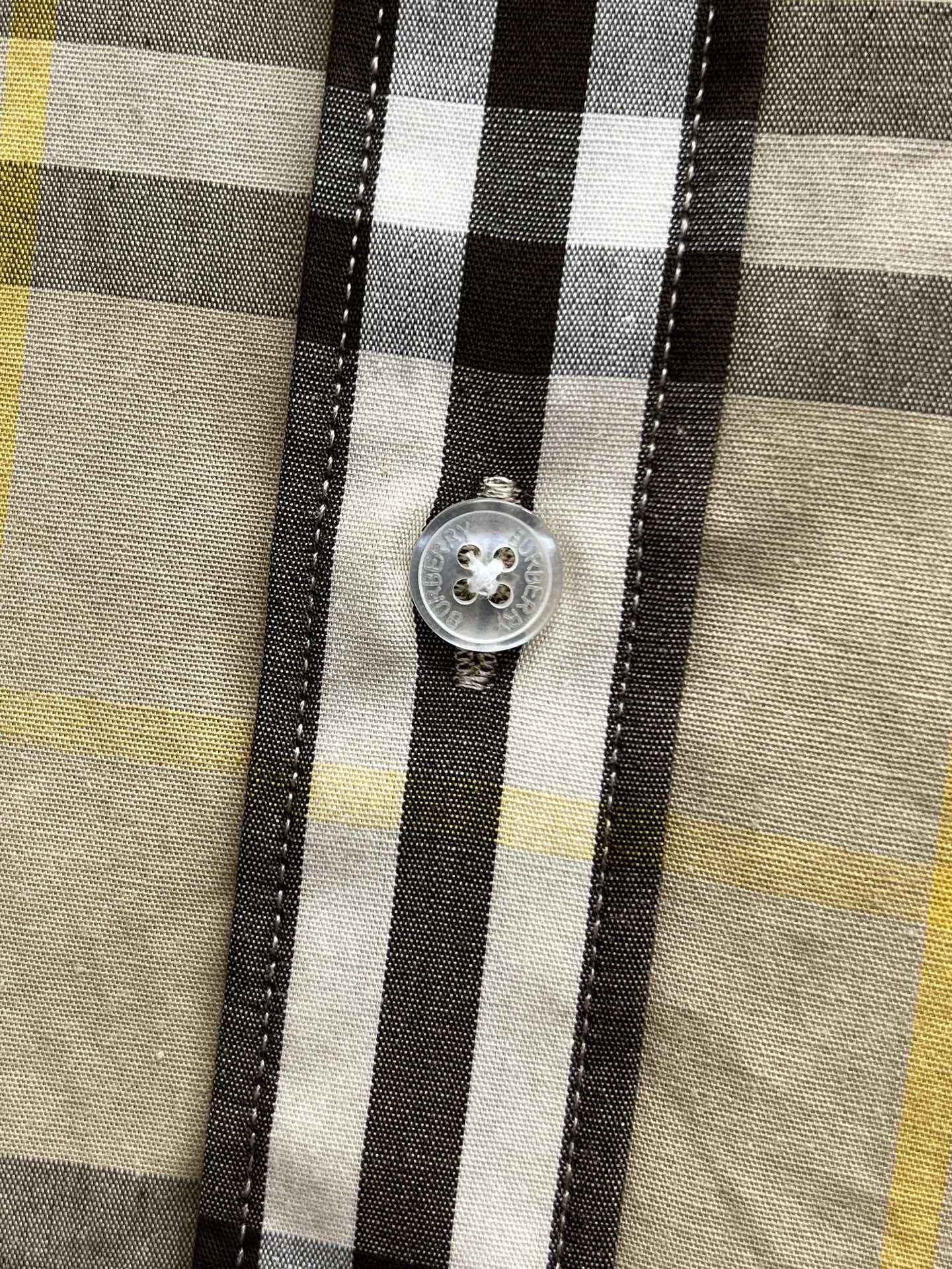 Plaid long-sleeve shirt button front, cream base with black and yellow vertical stripe checks