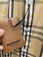 Plaid long-sleeve shirt neckline with BURBERRY tag, cream base, black and yellow stripes