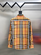 Long-sleeve plaid shirt on hanger, back view with yoke and buttons