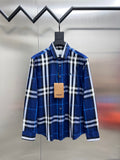 Long-sleeve button-up shirt in blue and white plaid, front view on hanger