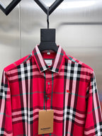 Red and black plaid long-sleeve button-up shirt with point collar and button placket