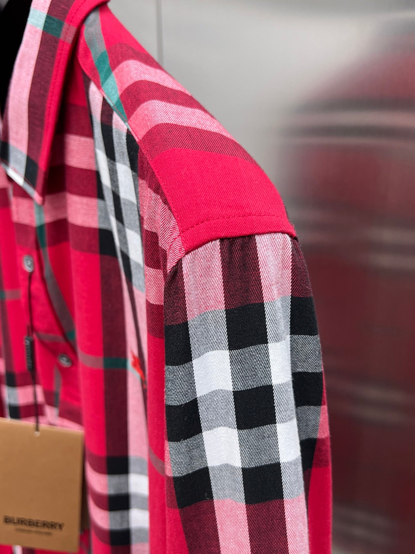 Red plaid long-sleeve shirt sleeve with black-and-white check panel