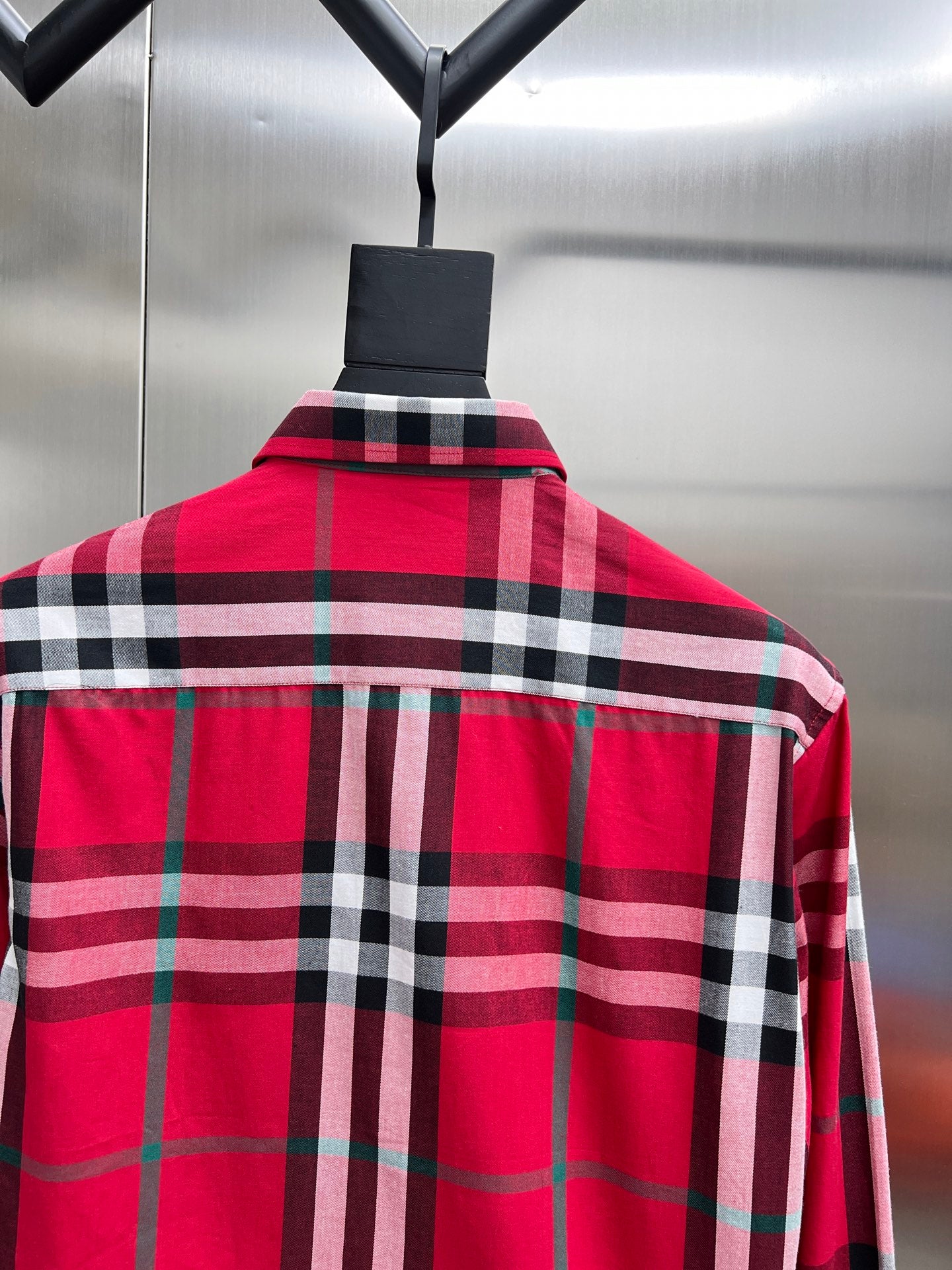 Red and black plaid long-sleeve shirt back view