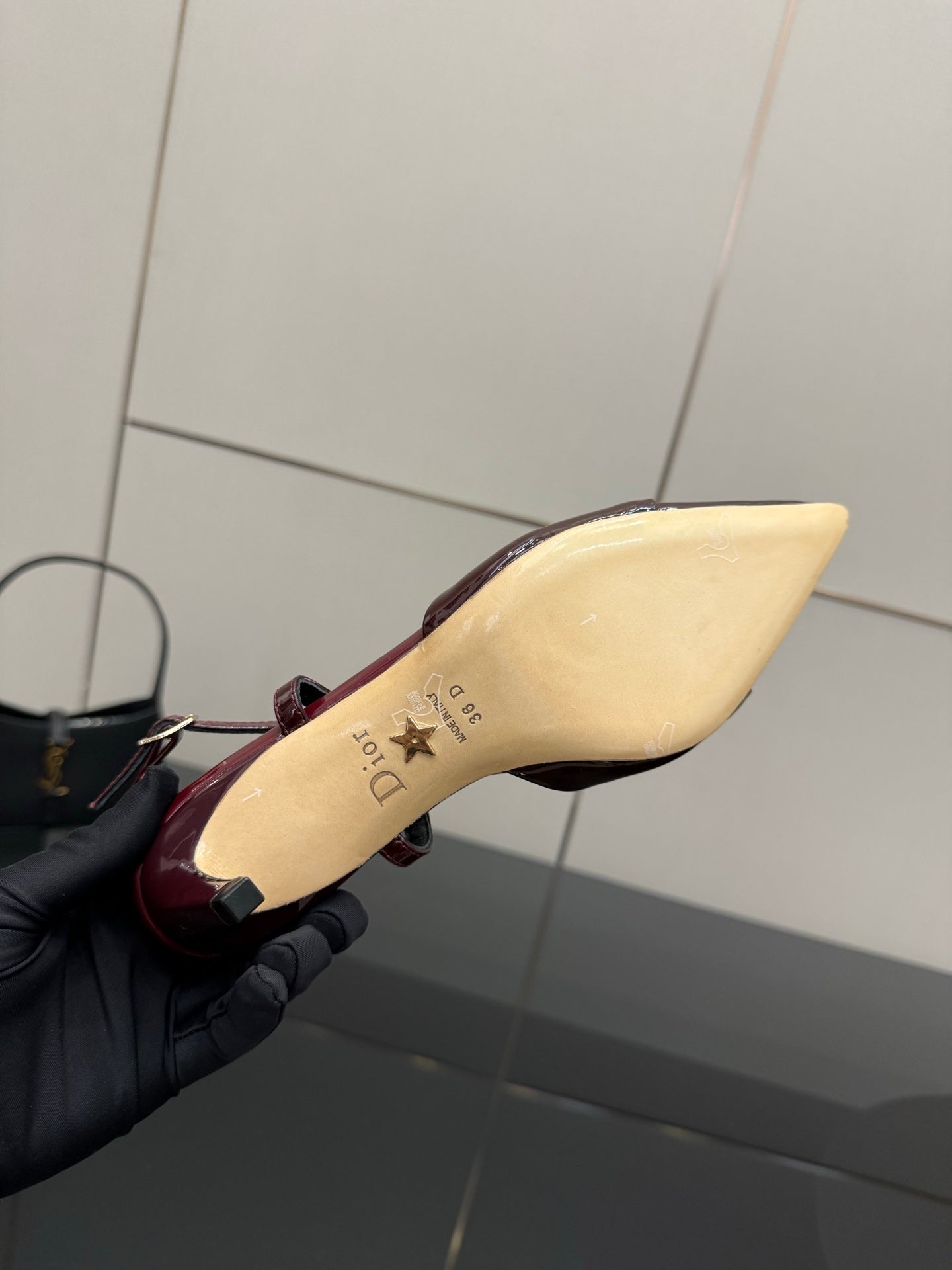 Ladies Dior burgundy slingback heel sole, cream footbed with star logo text