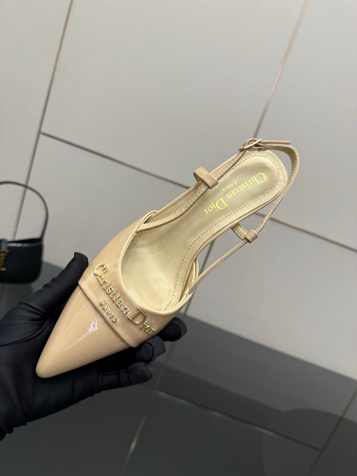 Dior ladies slingback heels, beige patent, side view with ankle strap