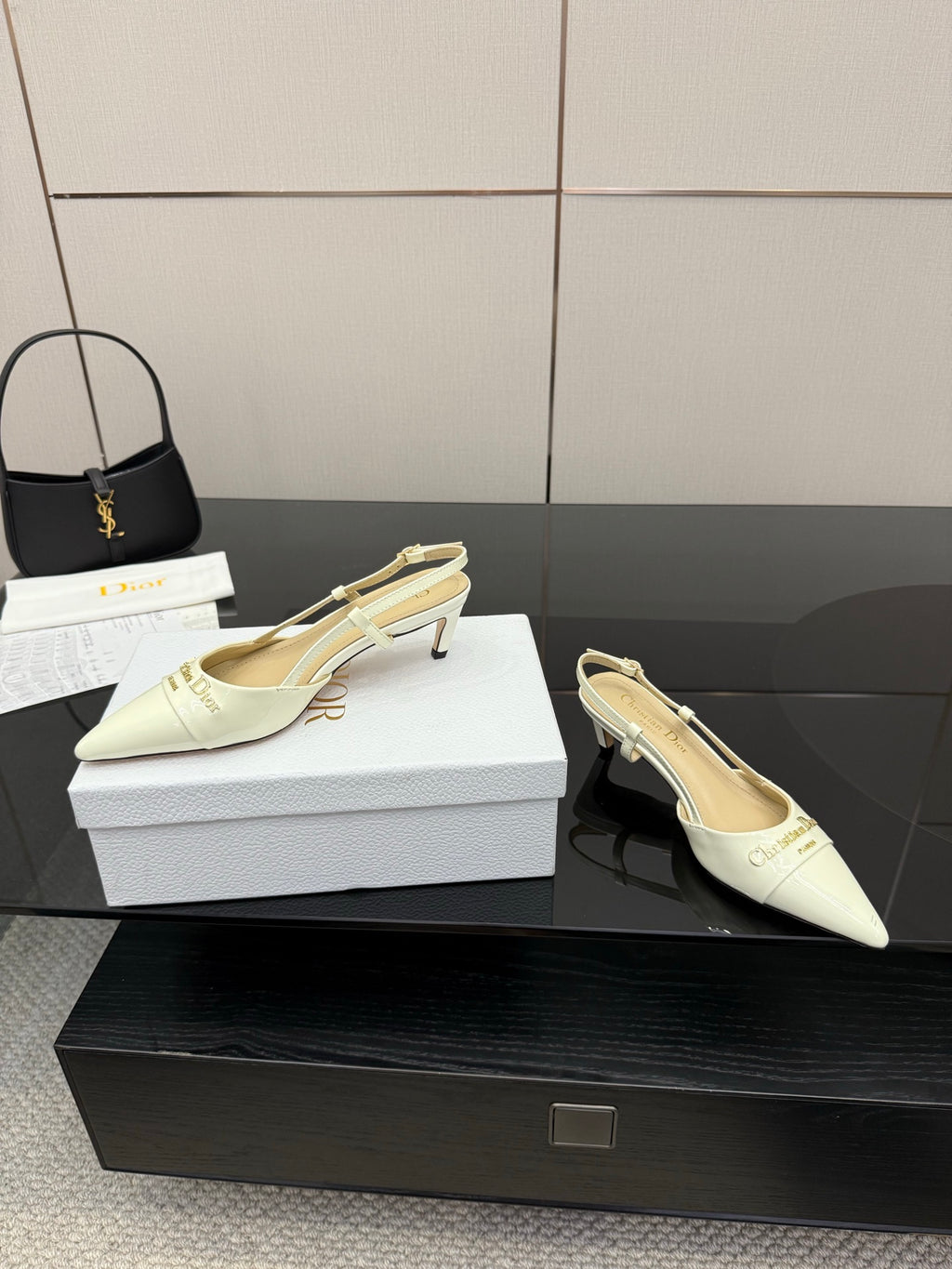 Ivory pointed-toe slingback heels with slim heel and light lining