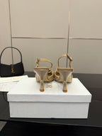 Beige point-toe slingback heels rear view with ankle strap and heel