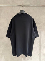 Black short-sleeve T-shirt back view on hanger