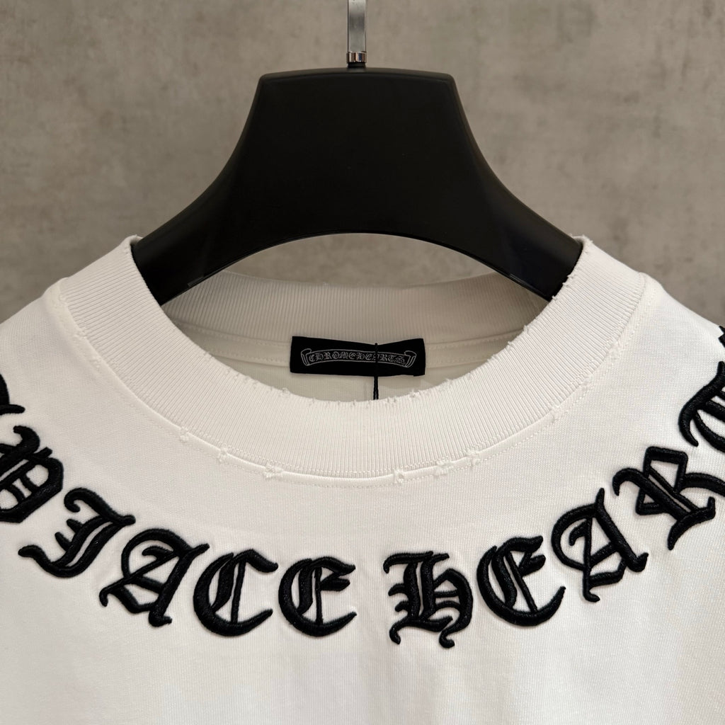 White short-sleeve T-shirt with crew neck ribbing and inner neck label
