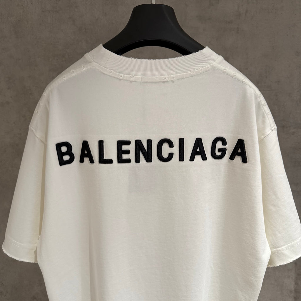 White short-sleeve T-shirt with BALENCIAGA logo across back