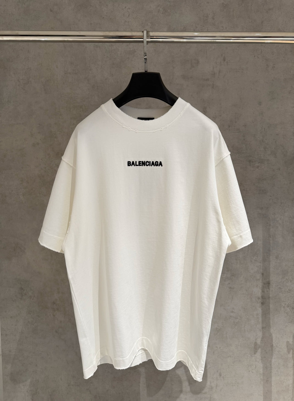 White short-sleeve T-shirt with BALENCIAGA logo at chest