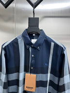 Navy plaid button-up shirt with long sleeves, pointed collar and front buttons