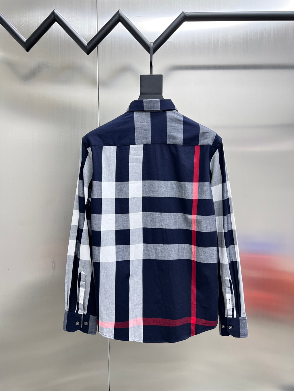 Long-sleeve plaid button-up shirt, back view, navy white and red stripe pattern