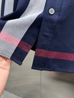 Long-sleeve check shirt cuff with two buttons and navy, gray, red stripe panels