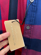 Hanging price tag and plaid long-sleeve button-up shirt with blue and red checks