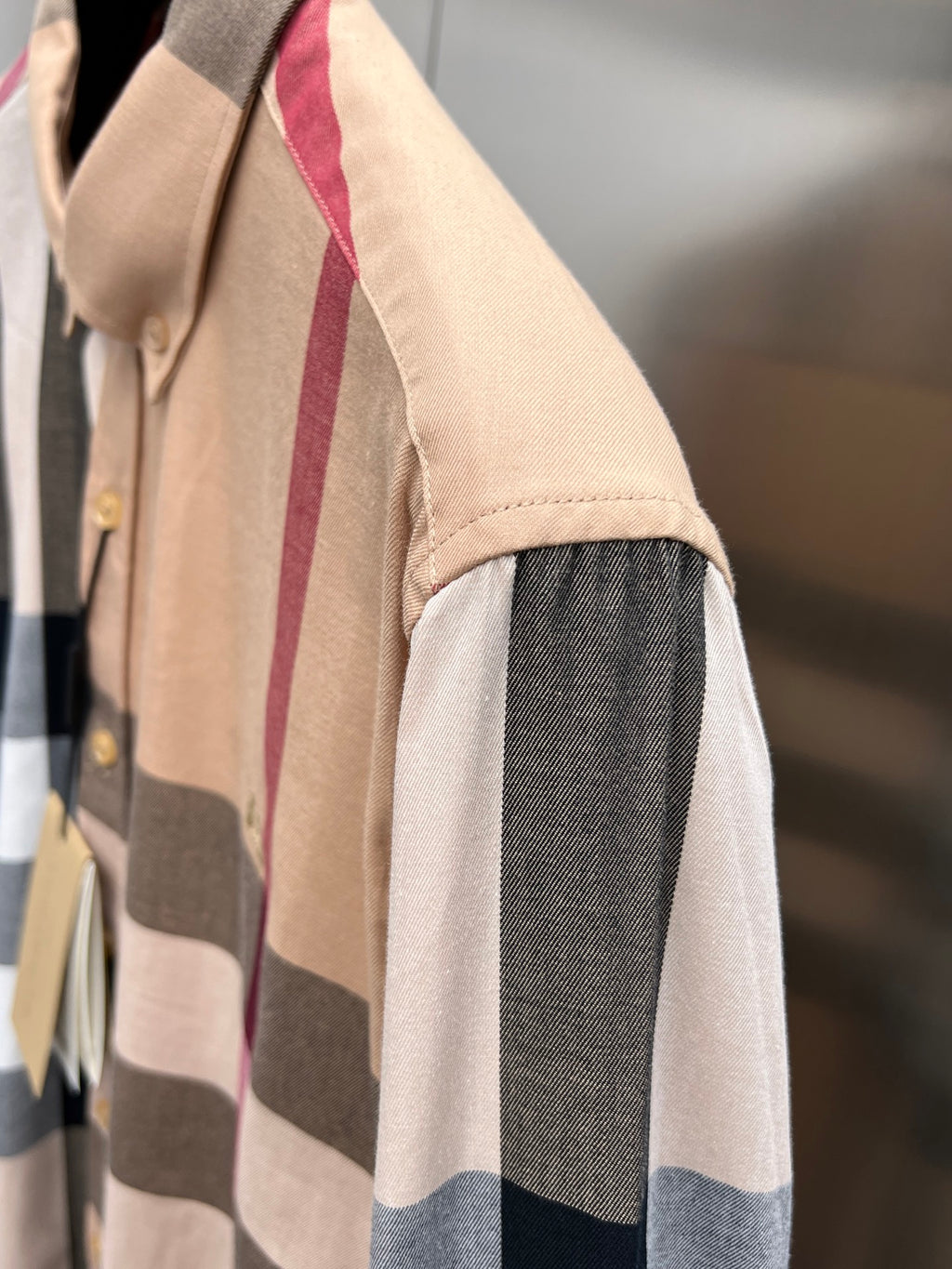 Burberry long-sleeve plaid shirt sleeve detail with beige cuff and contrasting panels