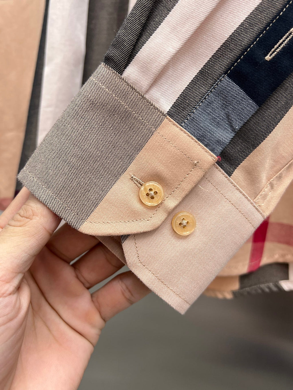 Long-sleeve button shirt cuff, beige with navy and gray plaid and two gold buttons