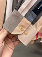 Long-sleeve button shirt cuff, beige with navy and gray plaid and two gold buttons