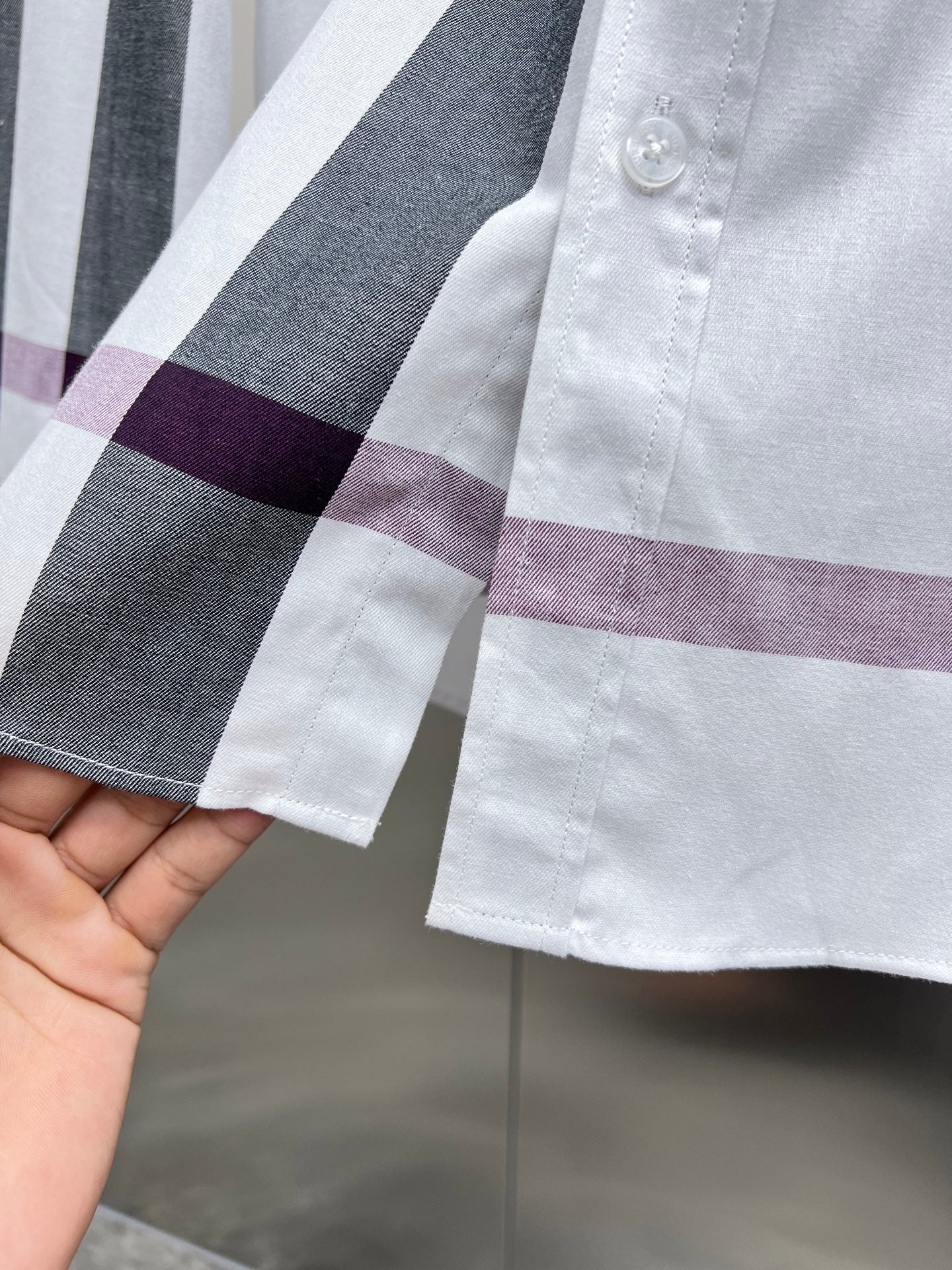 Long-sleeve button-up shirt, white with gray and plum check panel and cuff buttons