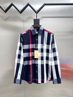 Long-sleeve button-up shirt in navy, white, and red plaid check
