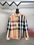 Long-sleeve button-up shirt in beige, navy, white, and red plaid