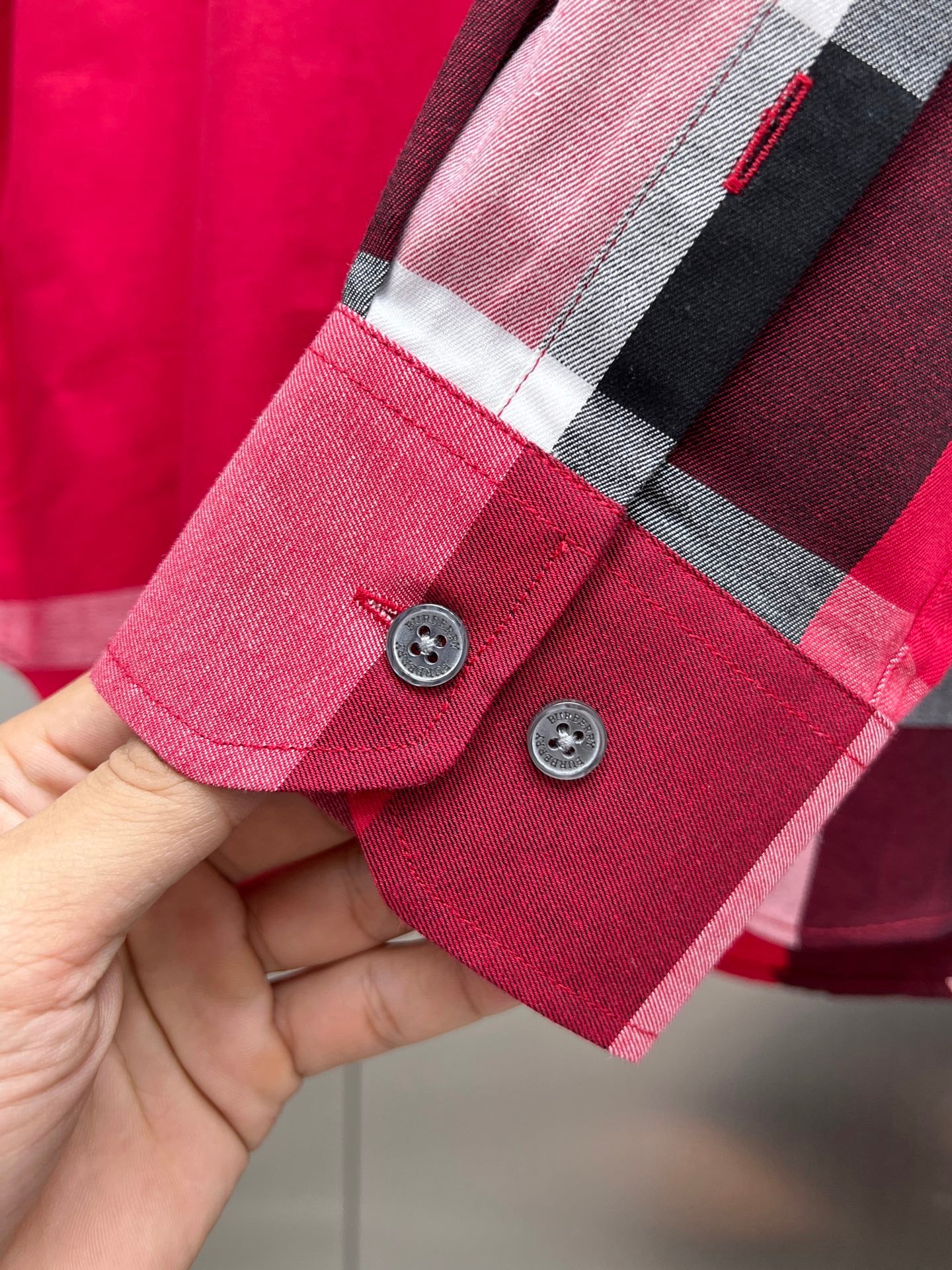 Long-sleeve shirt cuff with plaid trim and two-button placket