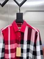 Burberry plaid button-up shirt front with red collar and dark check pattern