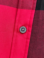 Burberry plaid shirt close-up of round button and seams