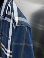 Burberry check shirt sleeve with blue base and white plaid stripes