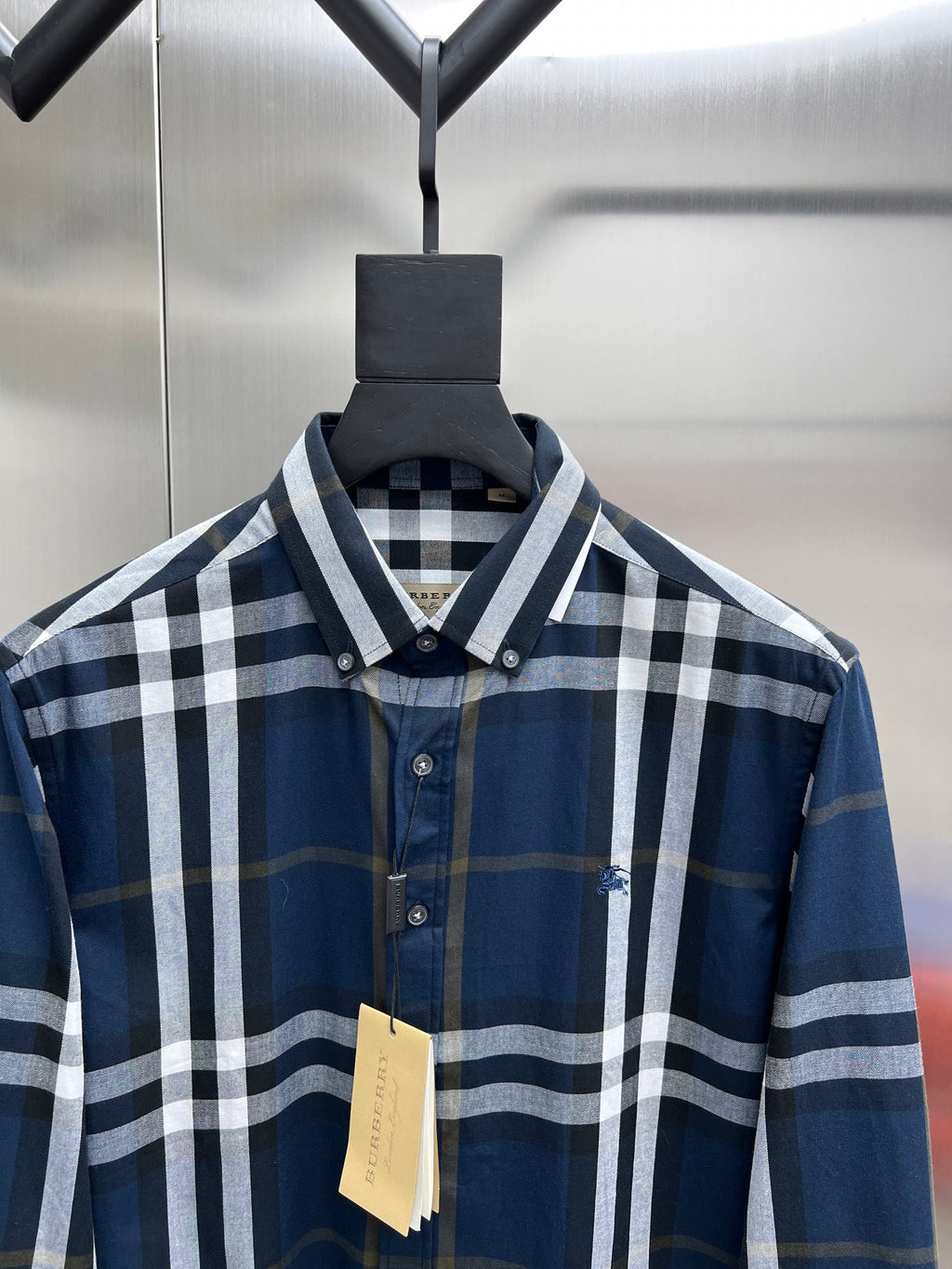 Burberry button-up shirt with blue and white check, pointed collar and buttons