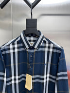 Burberry button-up shirt with blue and white check, pointed collar and buttons