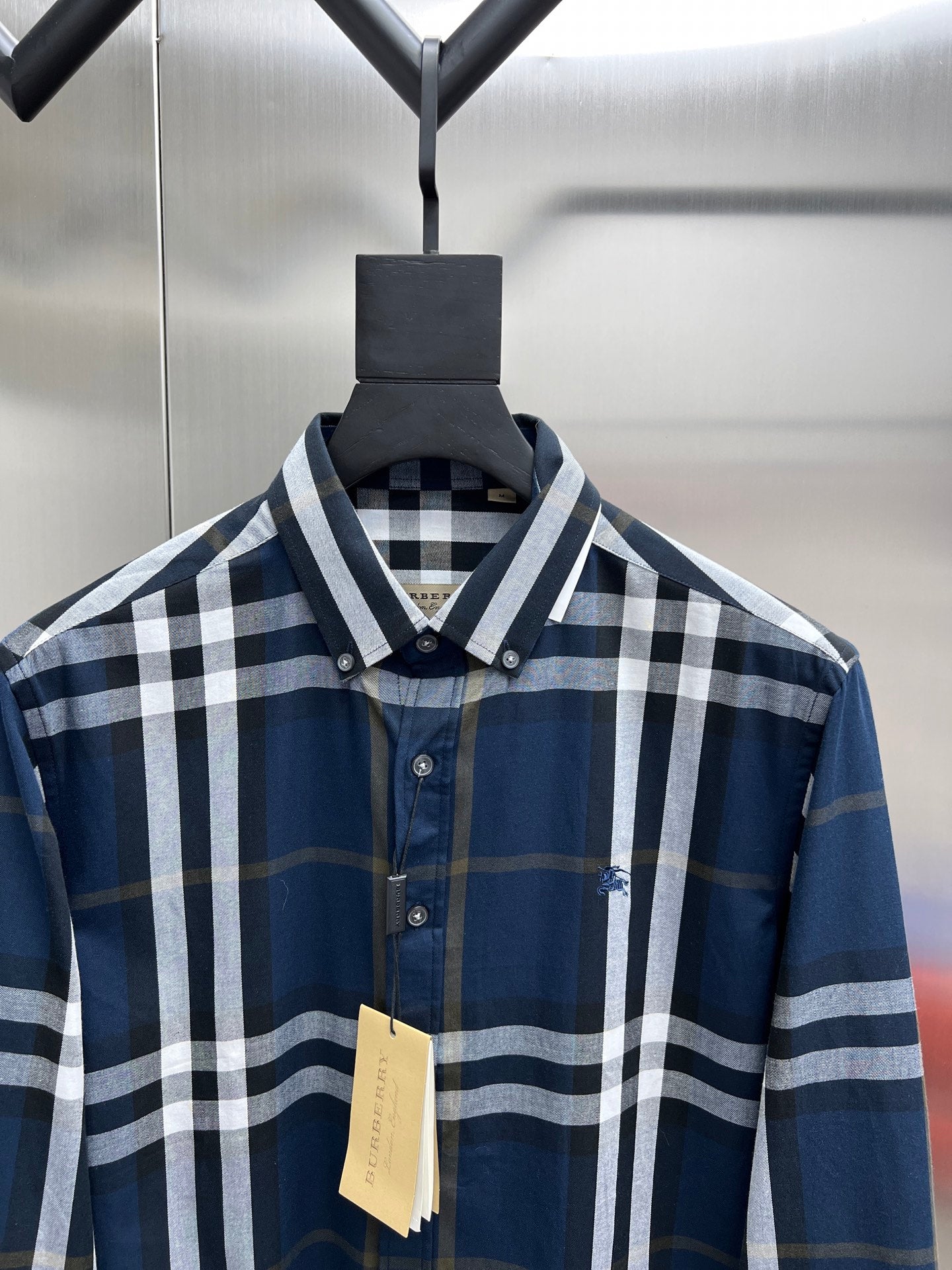 Burberry button-up shirt with blue and white check, pointed collar and buttons