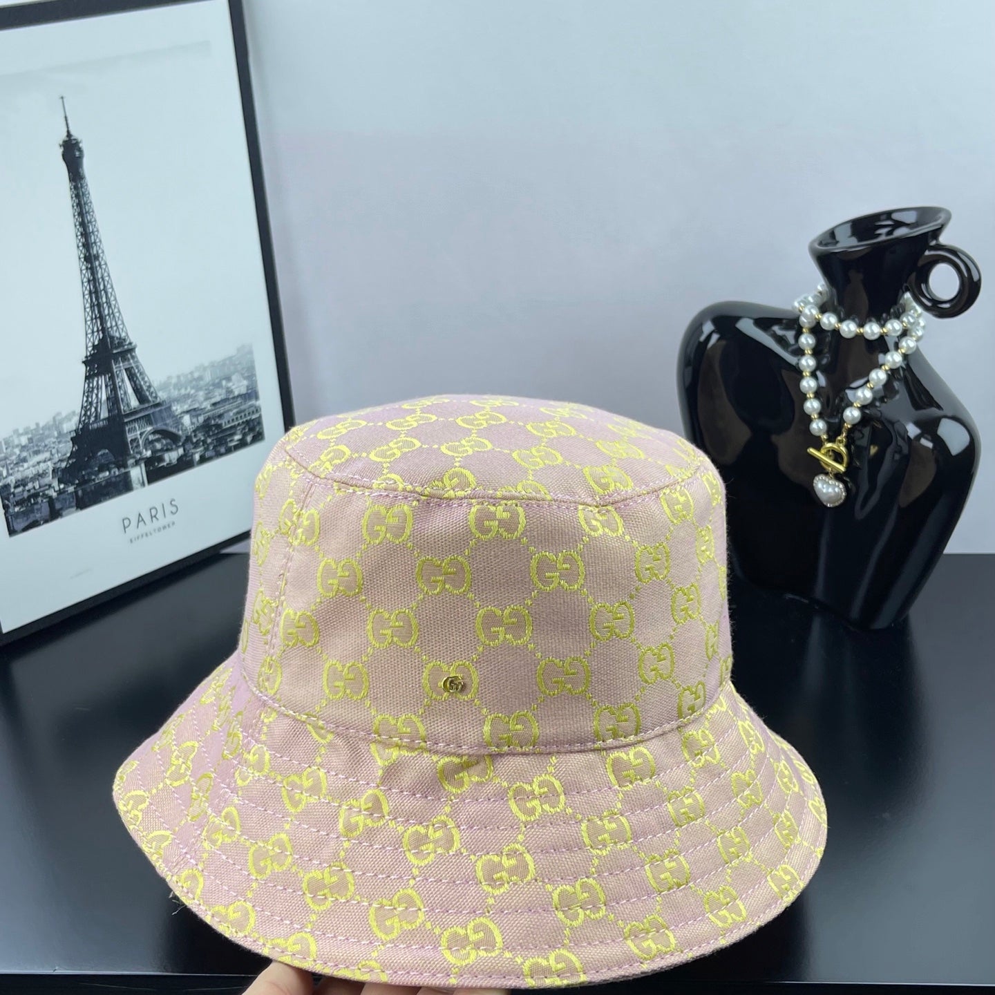 Light purple GG logo bucket hat with textured crown seams and stitched brim