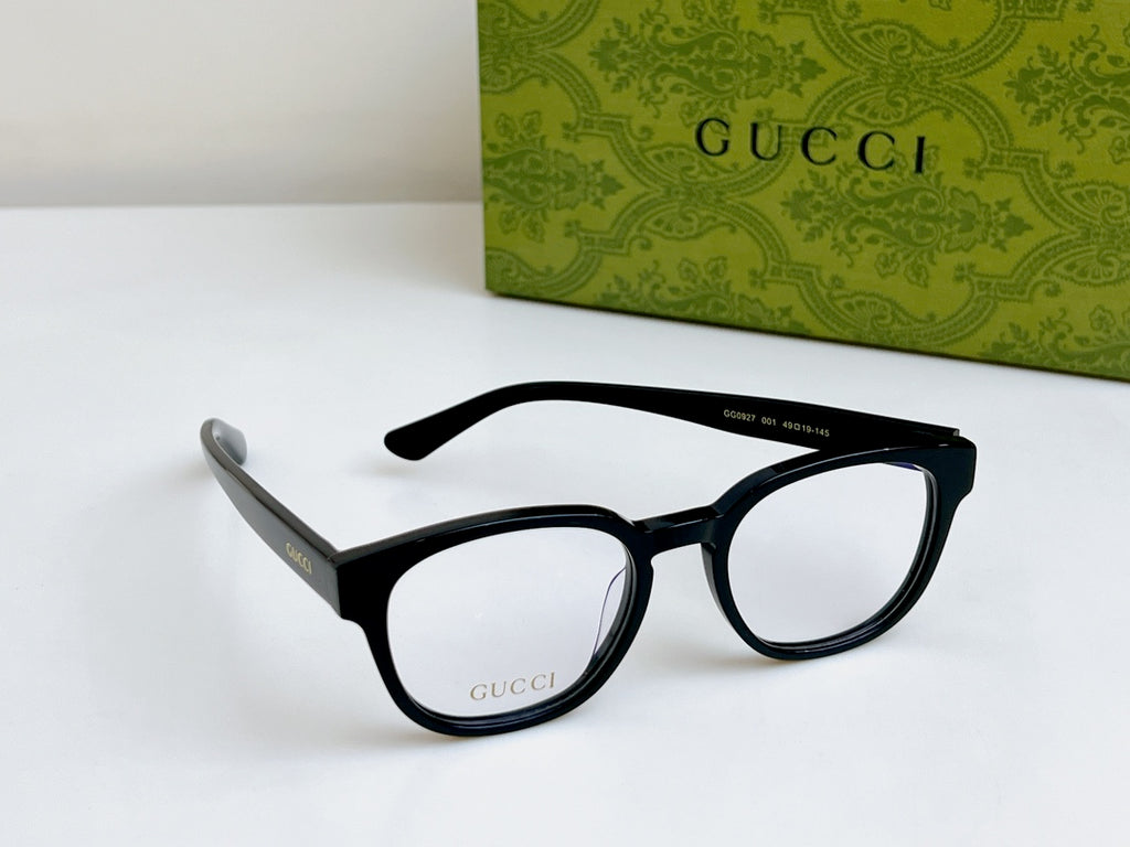 Black Gucci eyeglasses angled view with logo on temple and clear lenses
