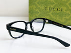 Black Gucci eyeglasses front-left view with square frames and clear lenses
