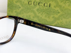 Gucci eyeglasses close-up of temple markings, including “MADE IN ITALY”