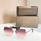 Bvlgari eyeglasses, pink gradient lenses, gold-tone frame, black temples.