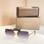 Bvlgari eyeglasses, deep purple lenses, gold-tone frame, black temples.