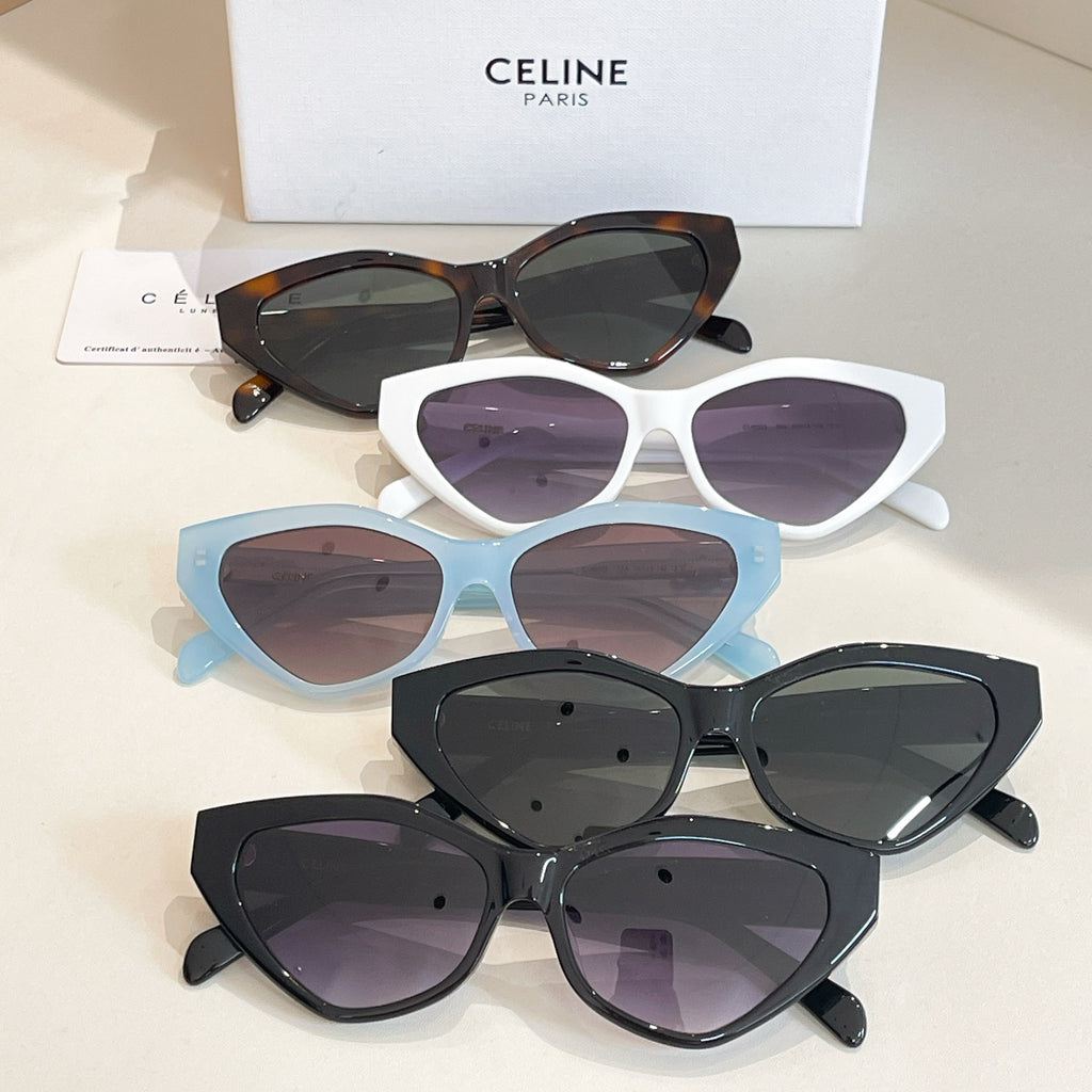 Assorted cat-eye sunglasses with dark lenses in black, white, blue, and tortoiseshell