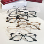 Gucci glasses: assorted round frames in black, tortoise, clear, and silver tones, with cases