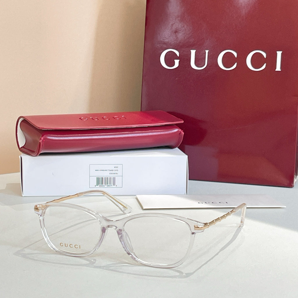 Gucci glasses: light-clear round frames with gold temples, with red case and box